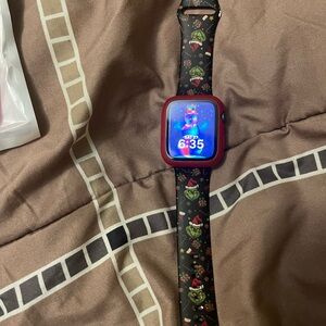 Apple Watch with Red Case and Black Grinch Band